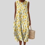 Robe blanche avec des fleurs jaunes