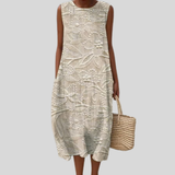 Robe beige avec broderie ornementale