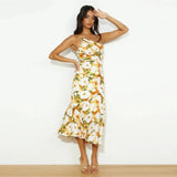 Cressier – Robe Maxi Asymétrique avec Motif Floral Délicat
