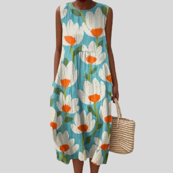 Robe turquoise avec des fleurs blanches