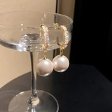 Boucles d'oreilles élégantes avec accents de perles