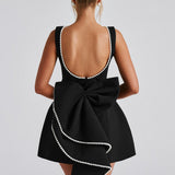 Veytaux – Robe Mini avec Nœud en Satin et Perles